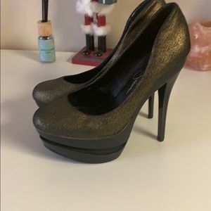 Gold and black platform stilettos